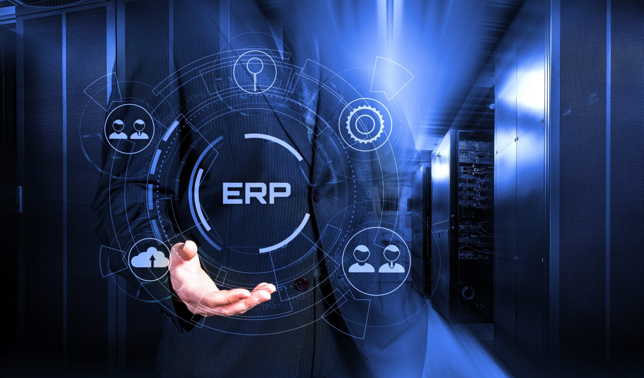 a man in a suit is touching the erp button