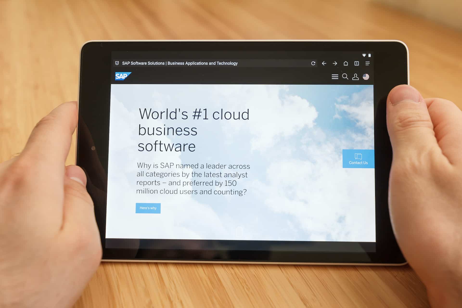 a person holding a tablet with the word world's 1 cloud on it