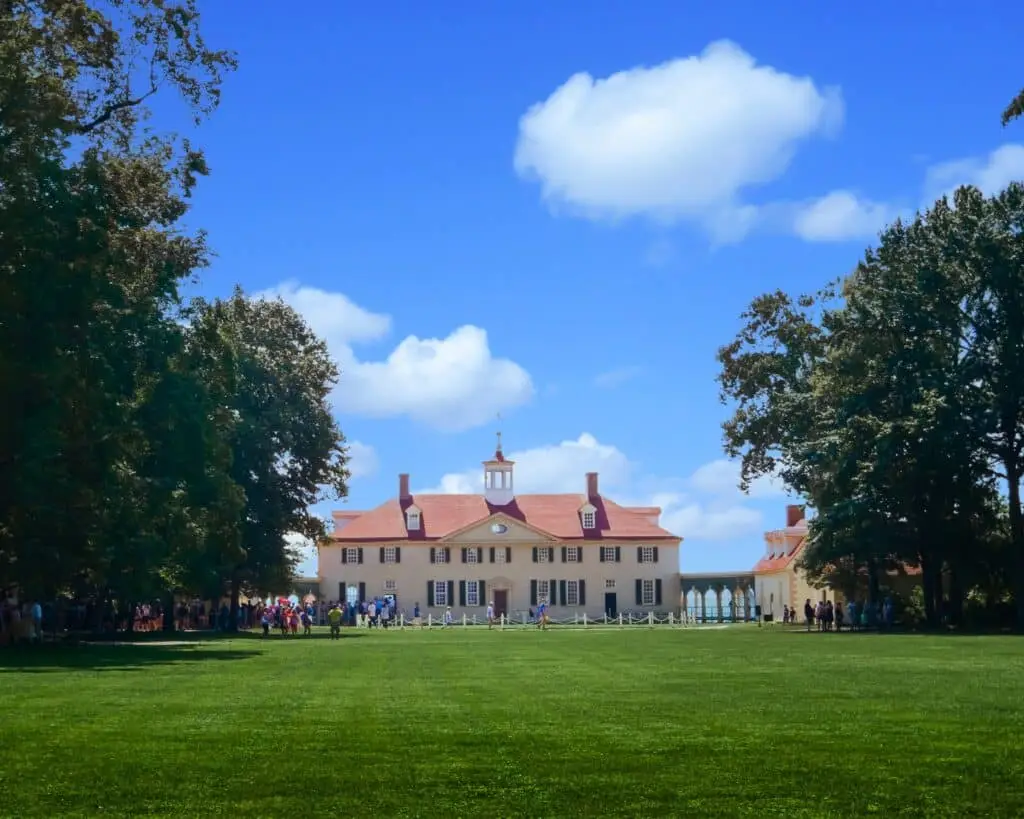 a large white building with a red roof