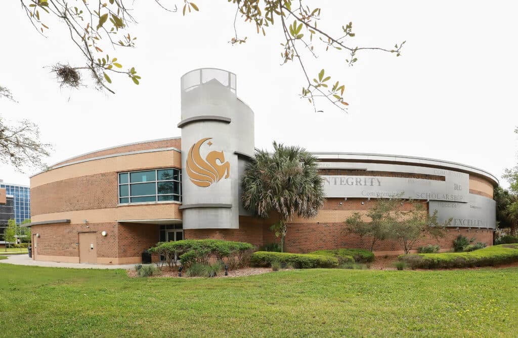 a large building with a clock on the side of it