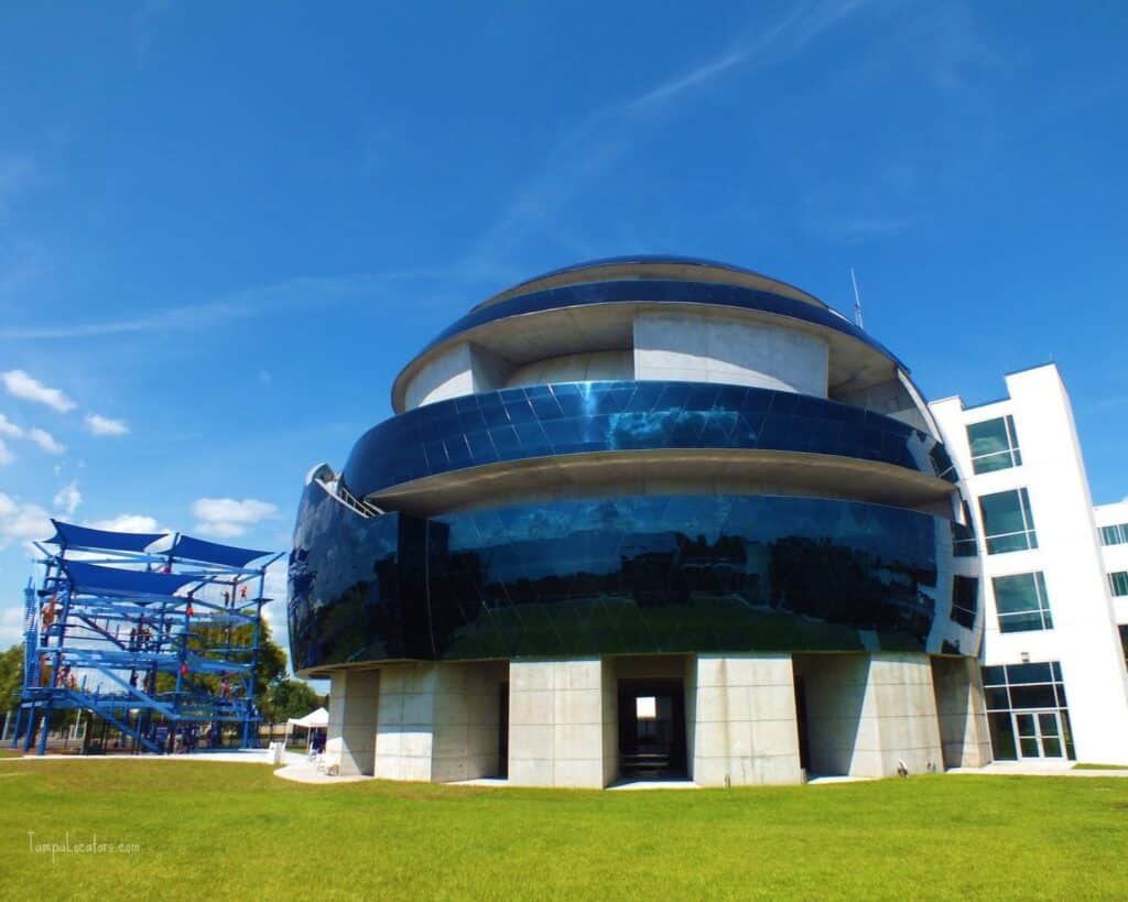 a large building with a blue dome on top of it