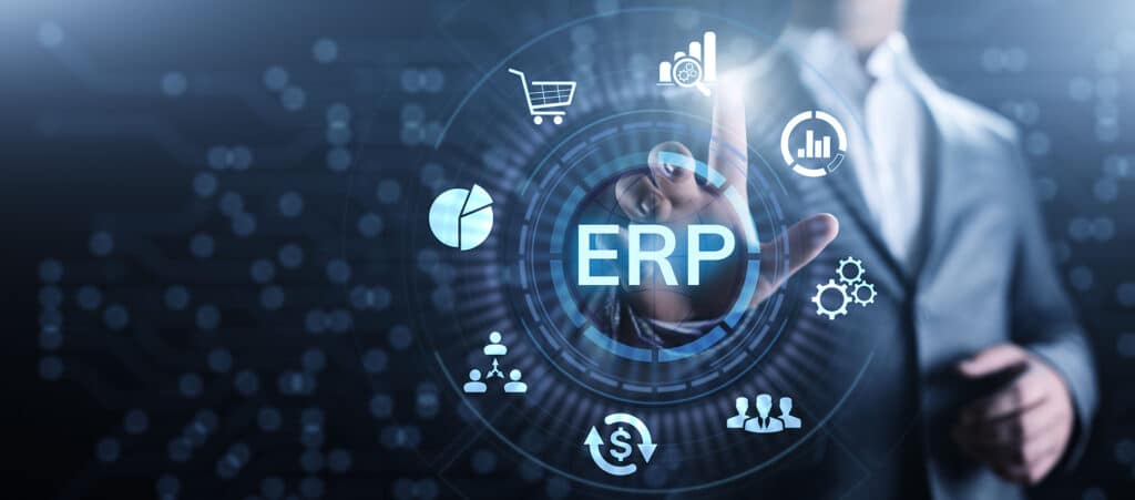 a man in a business suit touching the erp button