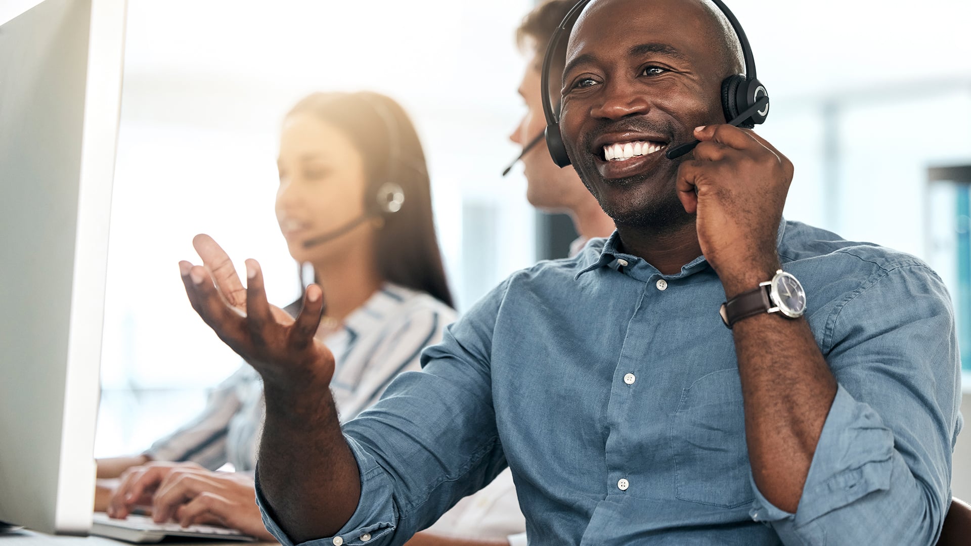 a man wearing a headset and talking on the phone