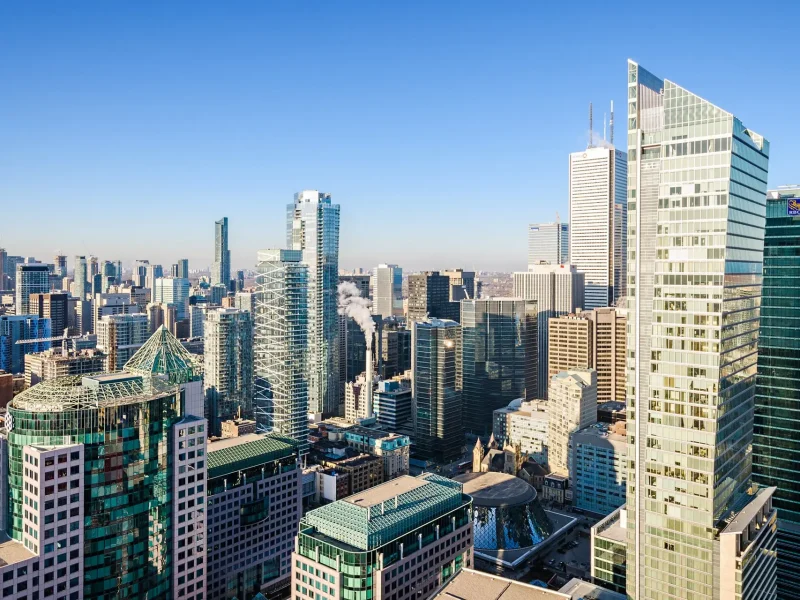 a city skyline with tall buildings and skyscrapers